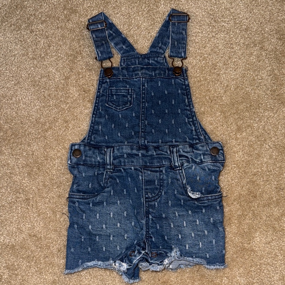 Blue Denim Overalls with Adjustable Straps and Distressed Hem